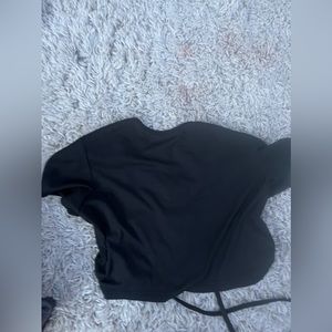 cute open back shirt